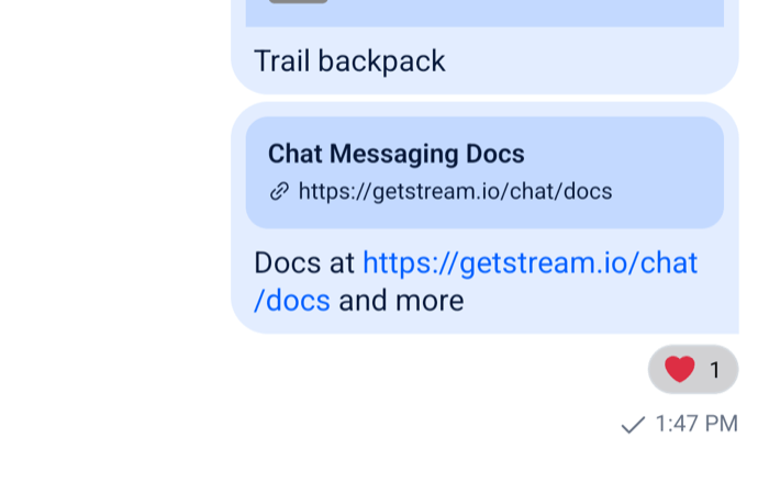 A message with two reaction chips under it, each with an emoji and a count on Android
